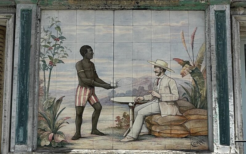 Ein Afrikaner bedient einen Weißen (Kolonialzeit)
